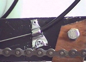 Cable stop riveted on